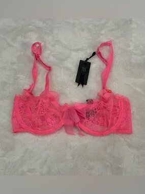 Victoria’s Secret designer collection fashion show neon pink lace bra